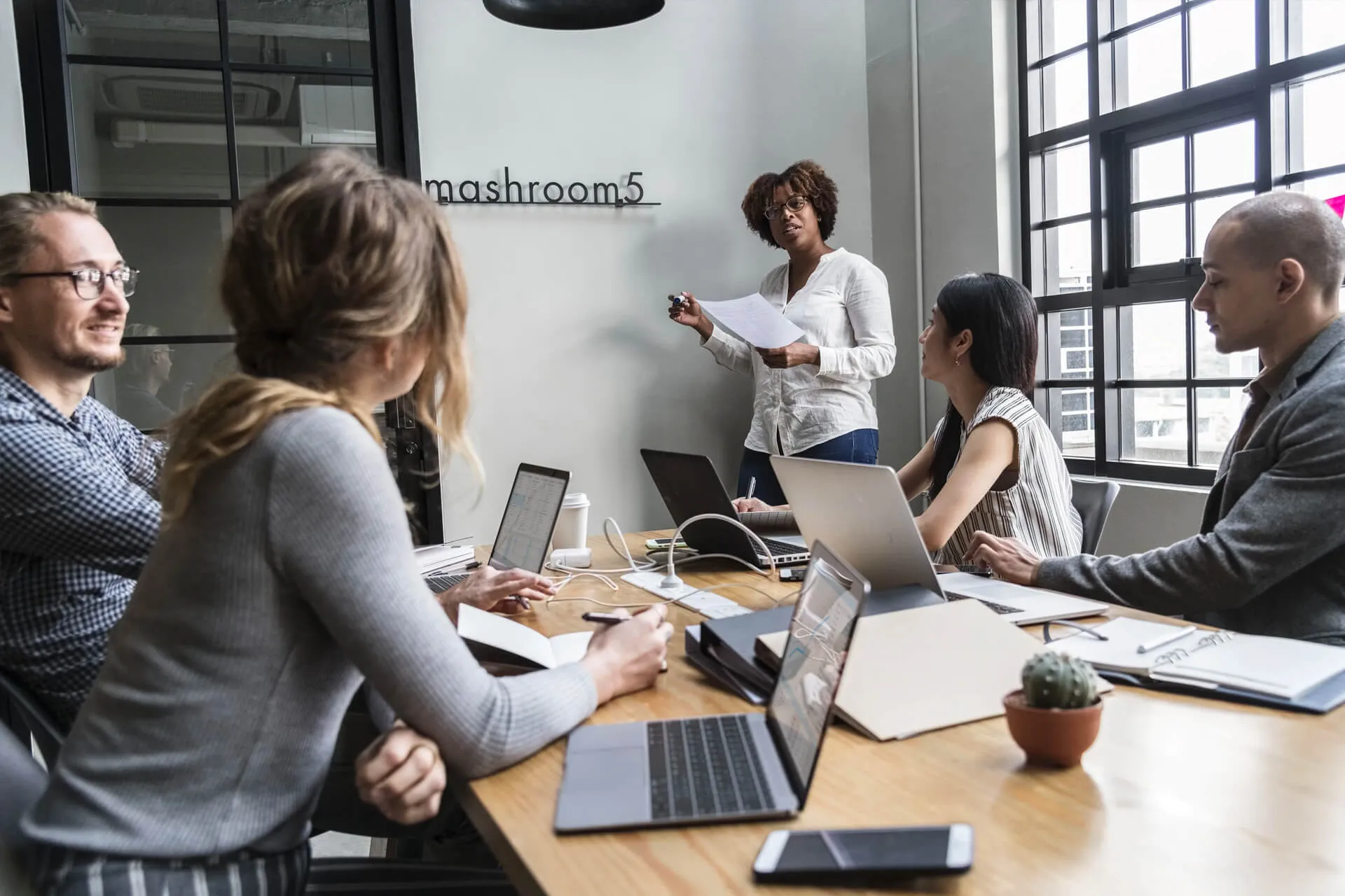 Ads company team collaborating on advertising campaign strategy